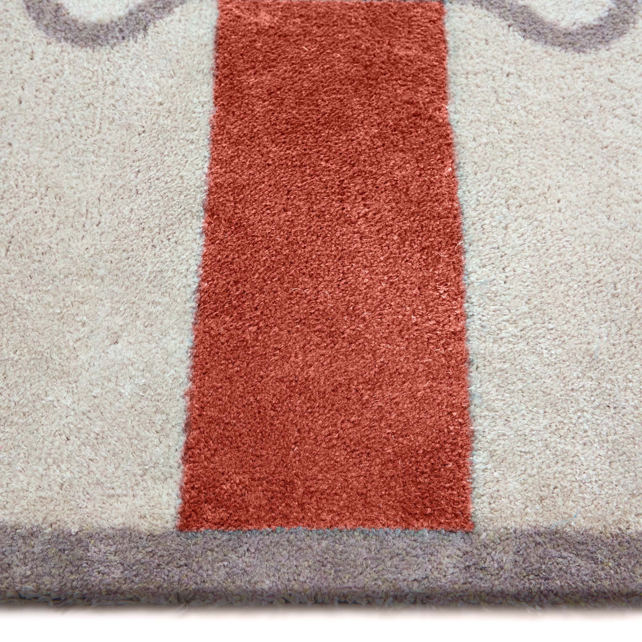 Bone Stripe Rust- 100% recycled cotton featuring a striped pattern with a bone in the centre.
