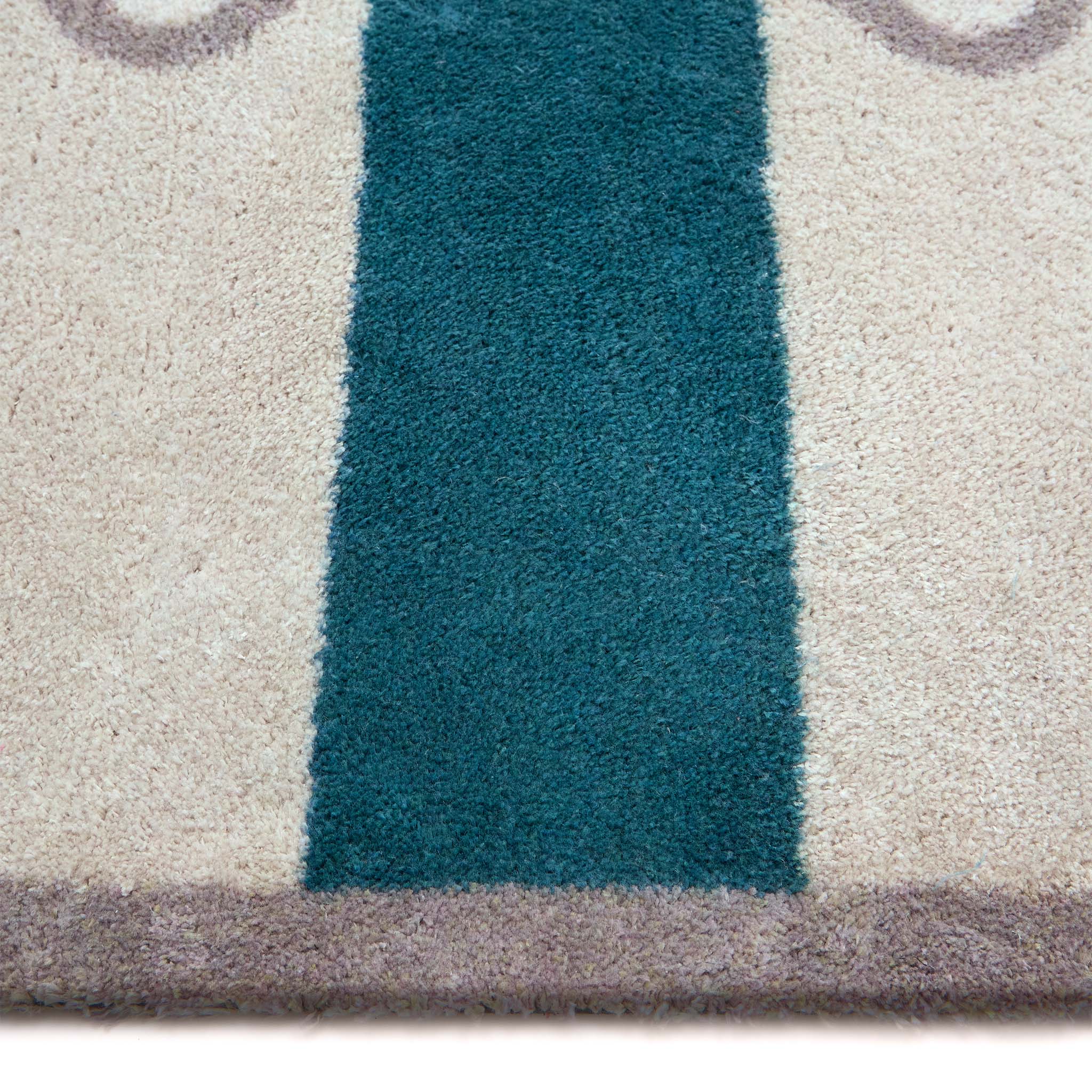 Bone Stripe Teal- 100% recycled cotton doormat featuring a striped pattern with a bone in the centre.