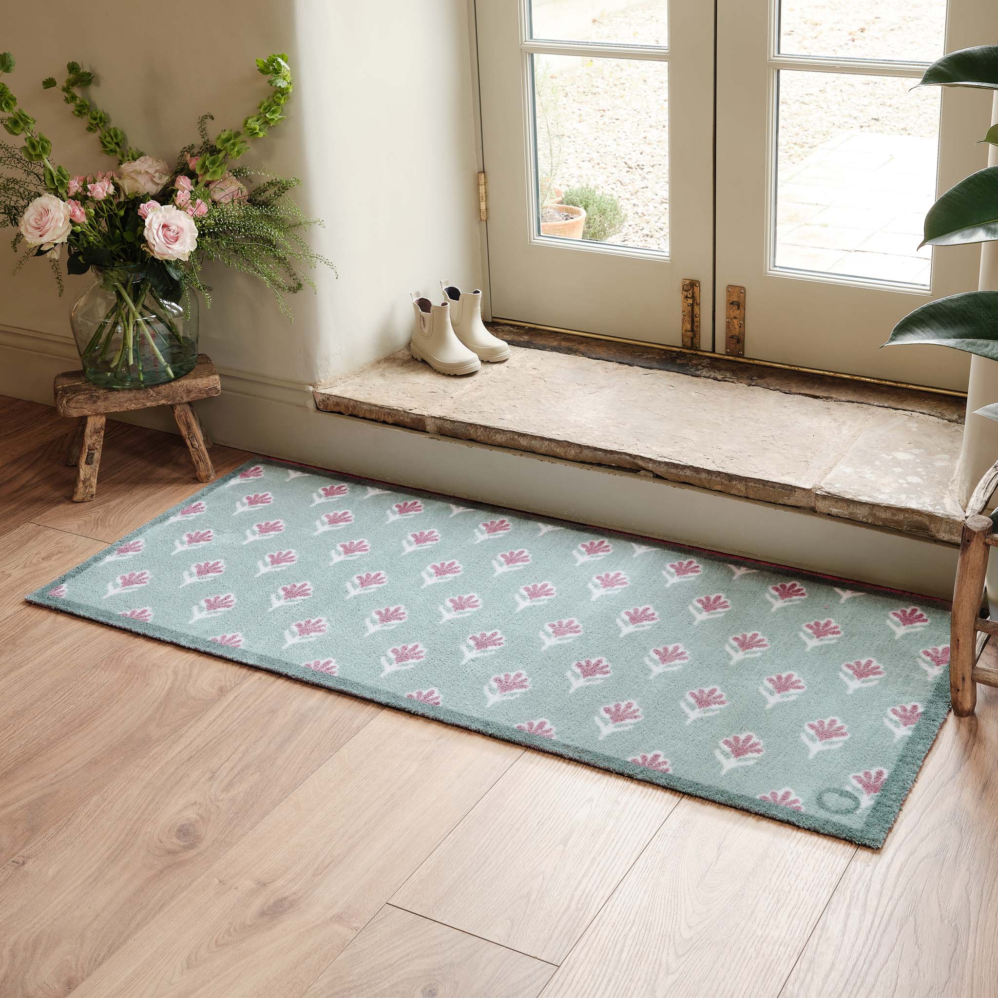 Ditsy Floral Green- 100% recycled cotton runner featuring a woodblock pattern of purple flowers.