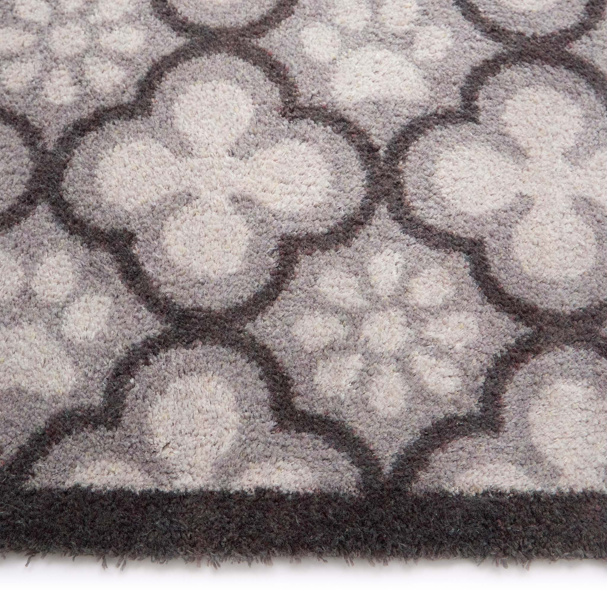 Paw Print Moroccan Tile Grey Detail. Made from 100% recycled cotton featuring paws prints within a morrcccan style pattern.