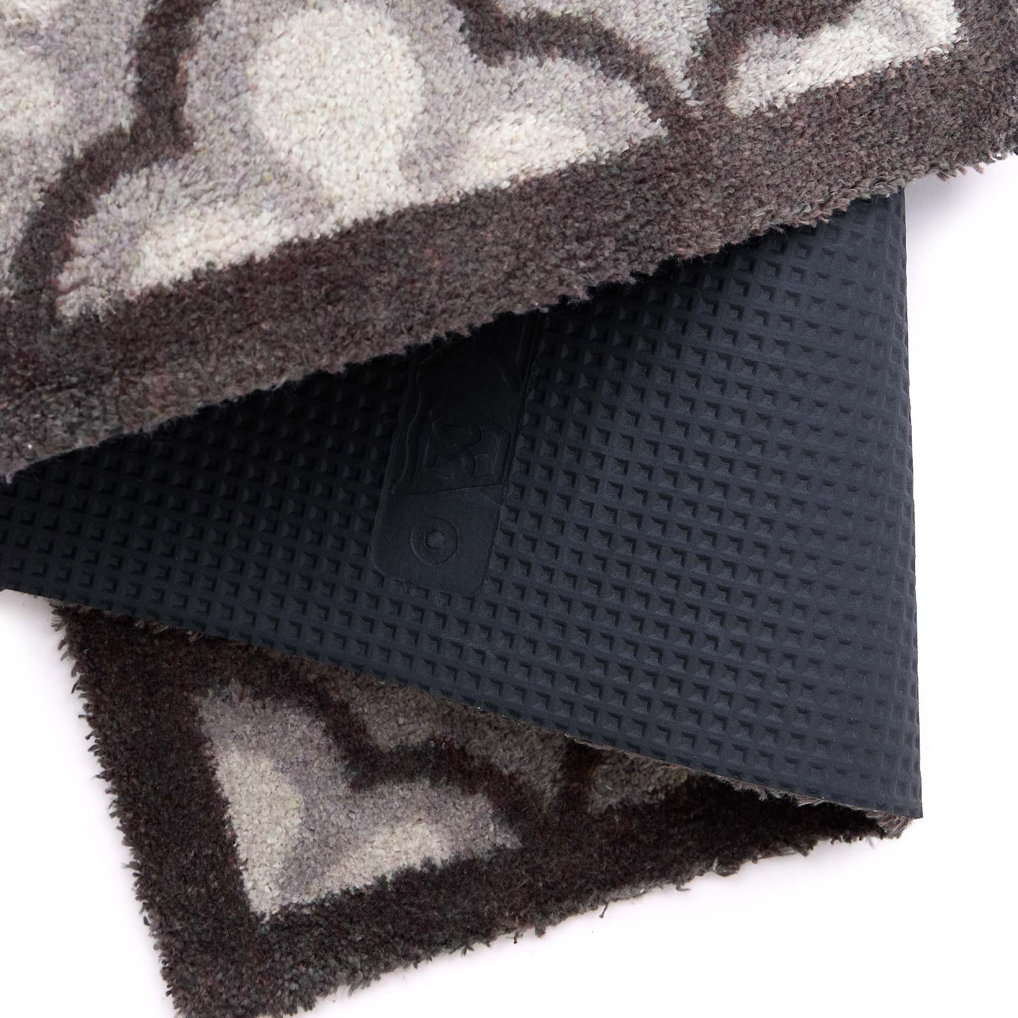 Paw Print Moroccan Tile Grey Detail. Made from 100% recycled cotton featuring paws prints within a morrcccan style pattern.