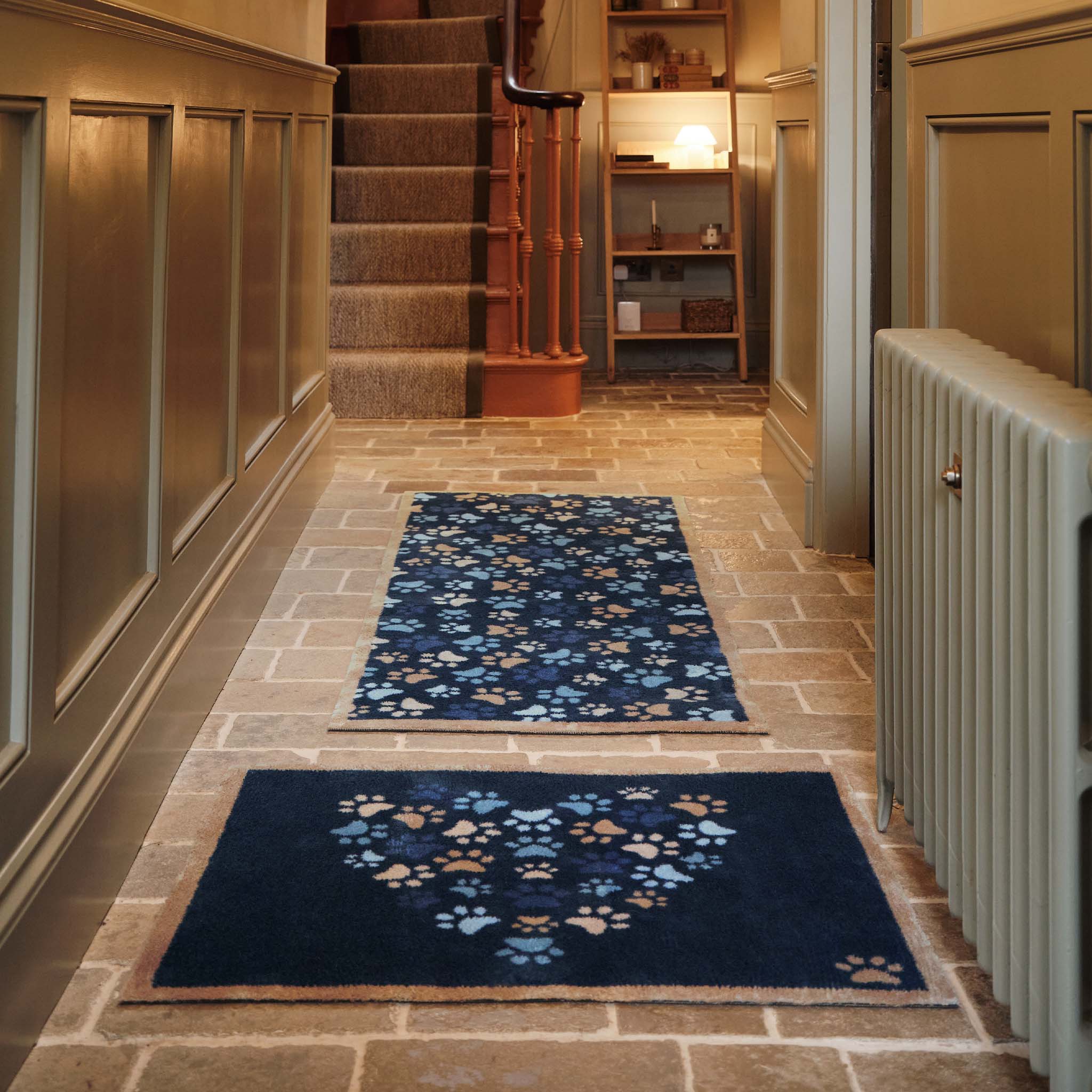 Paws For Love Blue Runner- 100% recycled cotton runner featuring multi- directional paw prints in a heart shape. 