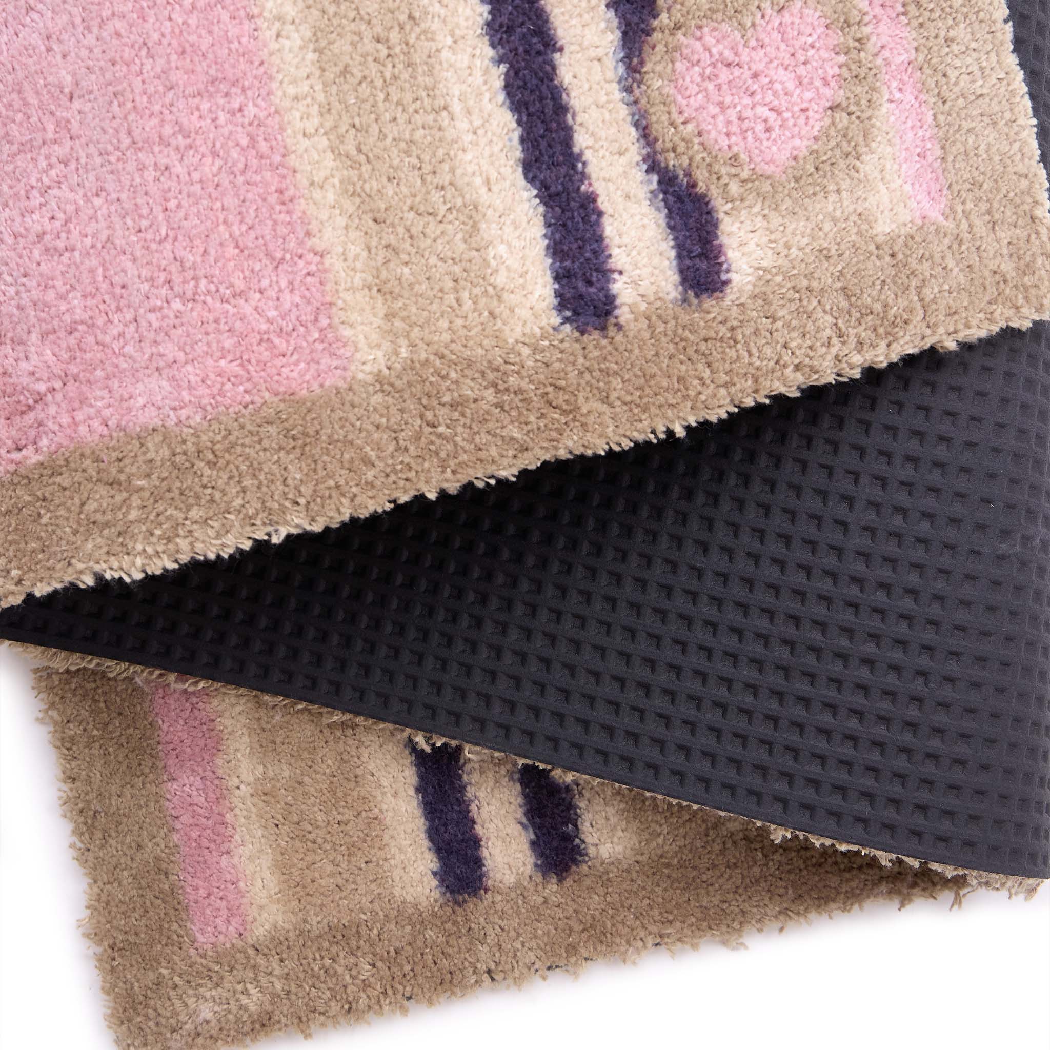 Timeless Stripe Blush Detail- Made from 100% recycled cotton featuring a pink and beige striped pattern.